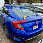 En cateo, asegura FGE tres vehículos con reporte de robo
